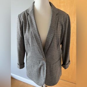 LC fitted blazer with one-button closure.